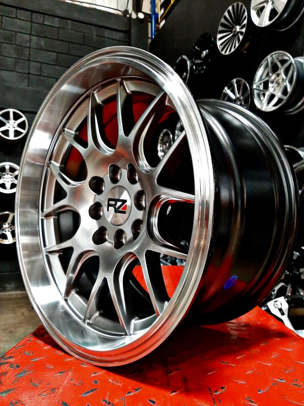 ARO 15X8.25 (L2125) 4/100/114.3 HYPER BLACK AND MACHINE LIP (SET 4 AROS)