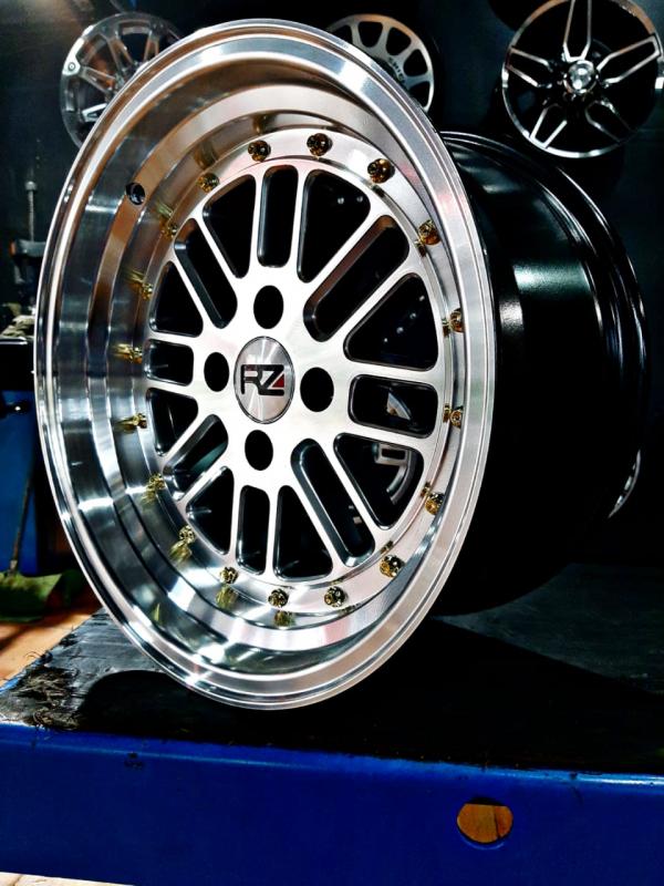 ARO 15X8 (L2009) 4/100 HYPER BLACK AND MACHINE FACE AND LIP WITH GOLD RIVETS (SET 4 AROS)