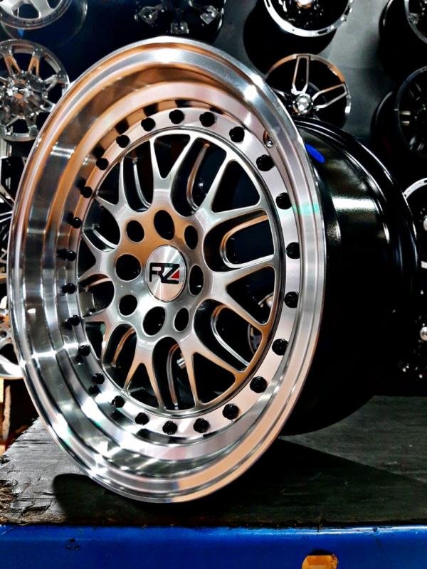 ARO 15X8.25 (L2126) 4/100/114.3 HYPER BLACK AND MACHINE LIP WHIT BLACK RIVETS (SET 4 AROS)
