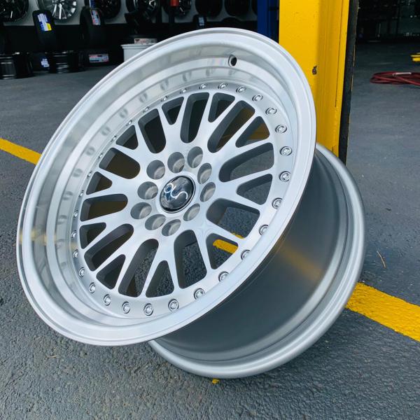 ARO 16X9 (L215) 5/100/114.3 SILVER AND MACHINE FACE AND LIP WITH CHROME RIVETS (SET 4 AROS)