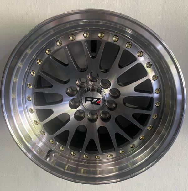 ARO 16X9 (L215) 5/100/114.3 SILVER AND MACHINE FACE AND LIP WITH CHROME RIVETS UNIDAD